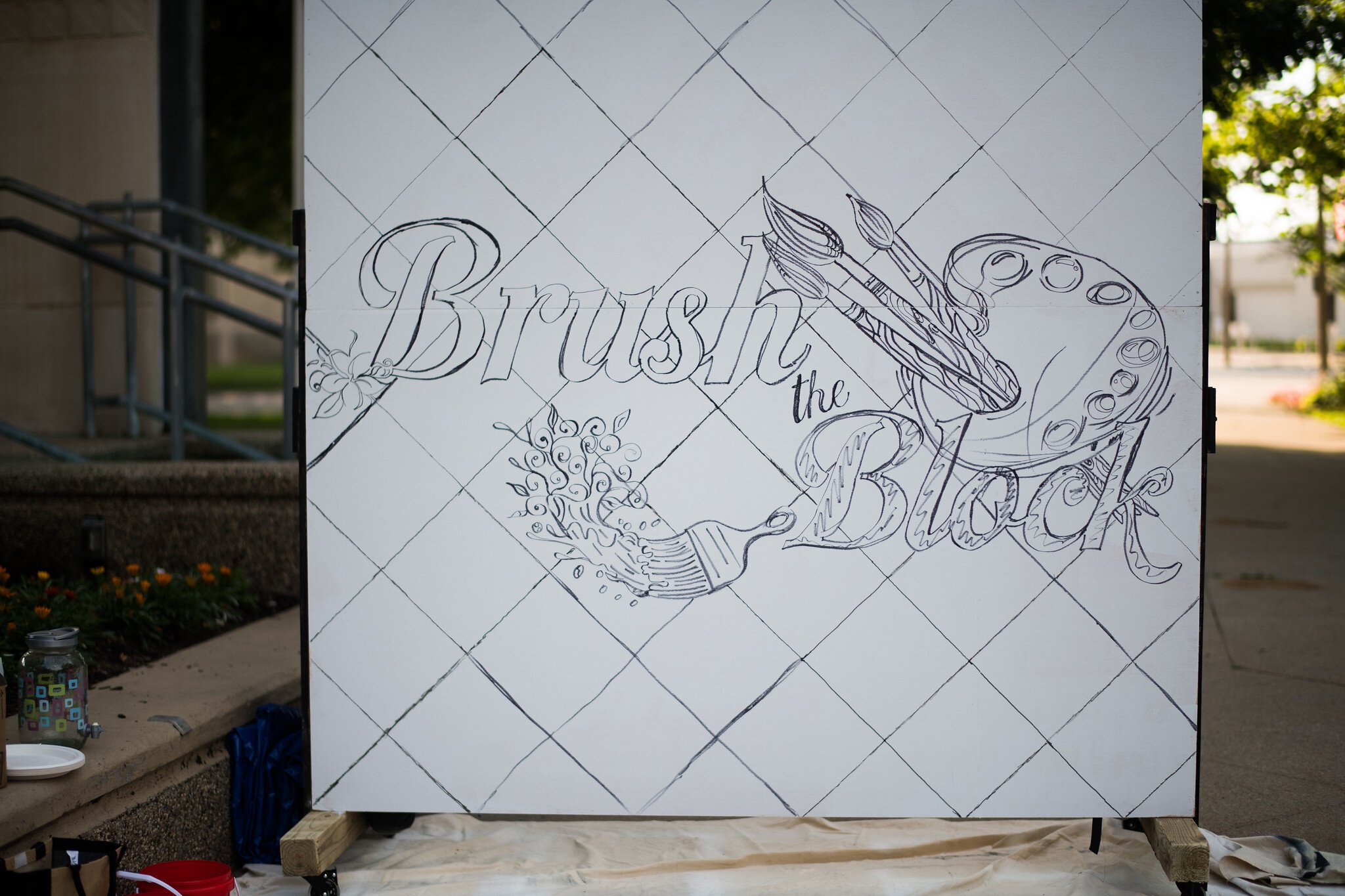 Attendees were invited to help paint the Brush the Block mural.