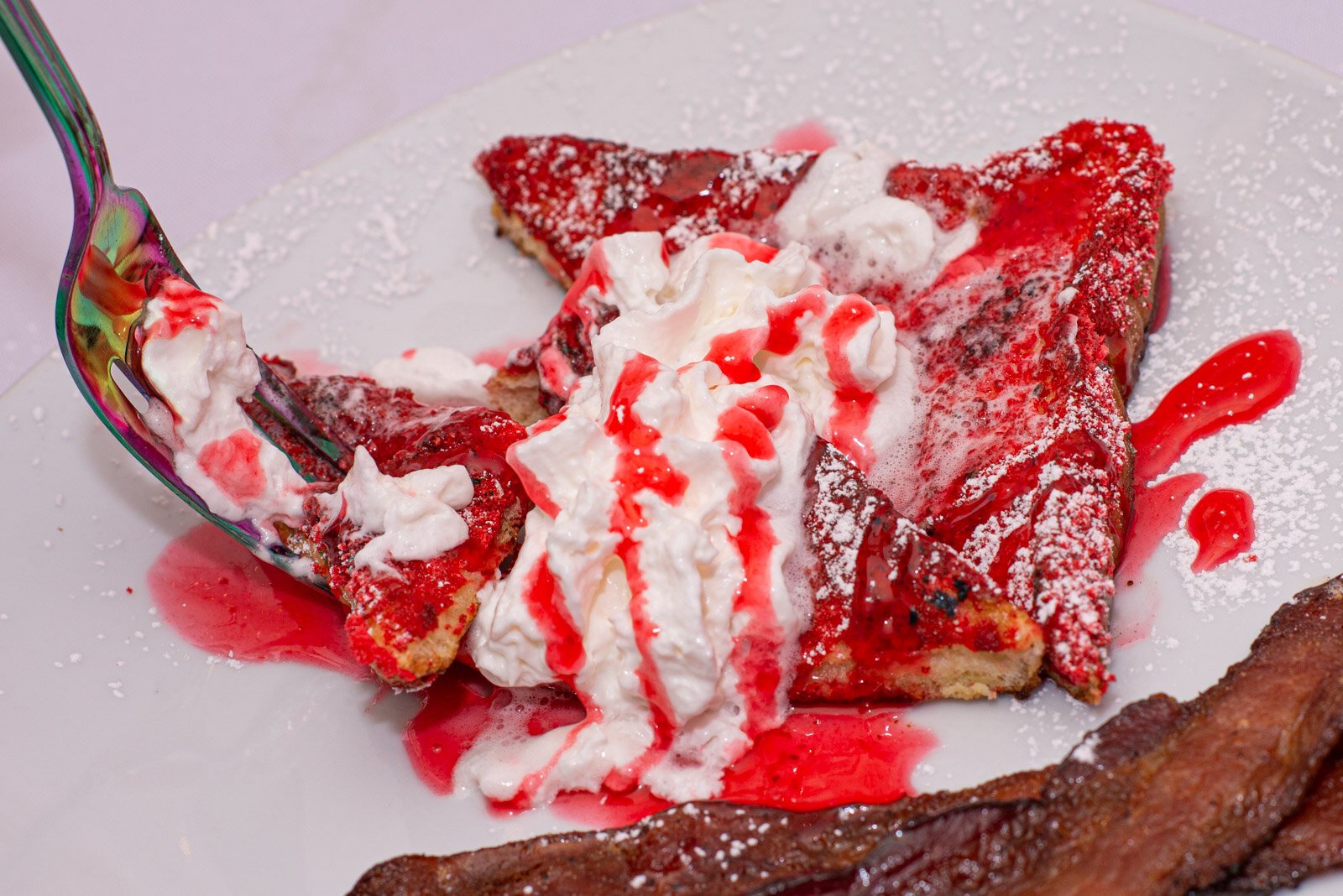 Digging into one of Hoodie's signature dishes, Crunchberry French Toast.