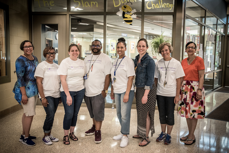 Teachers and staff greet visitors at the Washington Writers' Academy