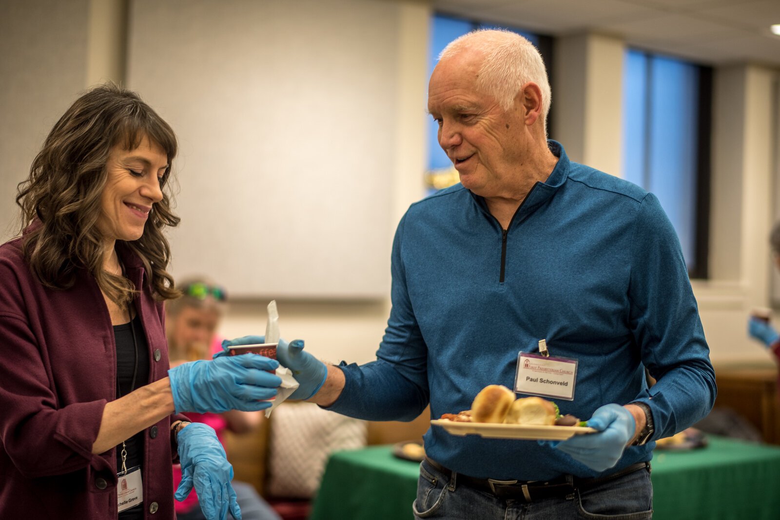 Church volunteers enjoy extending hospitality during Red Door dinners.