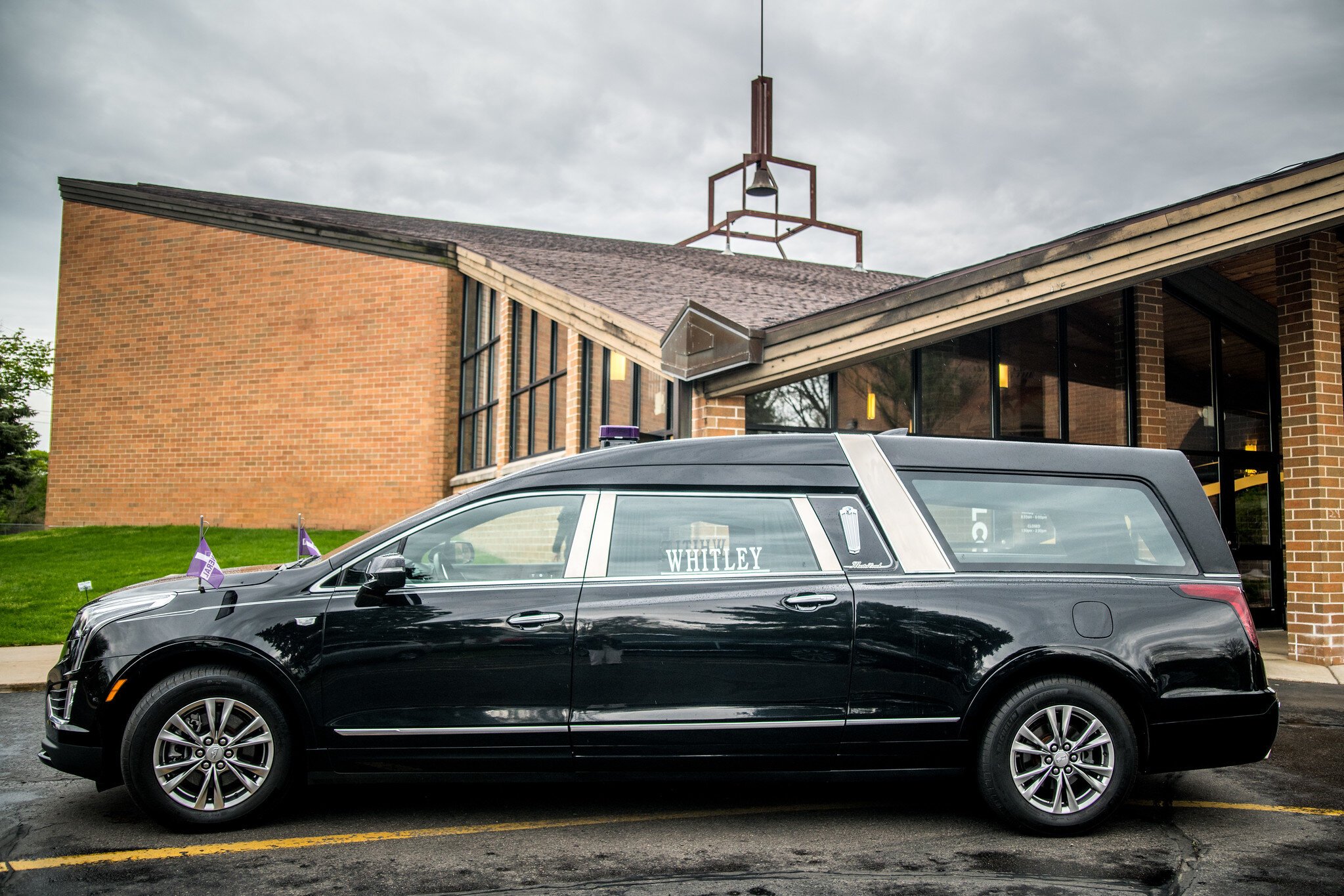 A hearse from Whiitney Memorial Funeral Home guided the walkers through the neighborhood.