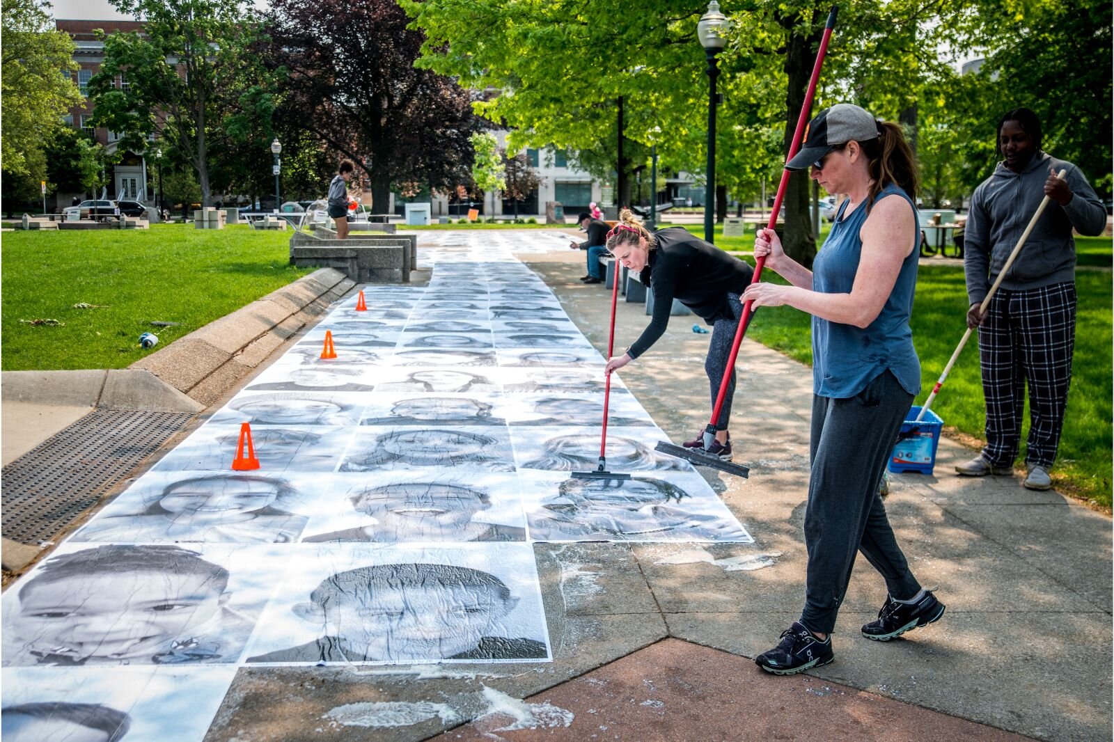 A thousand KPS' students have their photos on the sidewalks of Bronson Park as part of the Inside Out Project.