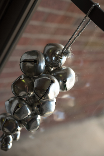 Bells on the front door of ENA announce visitors.