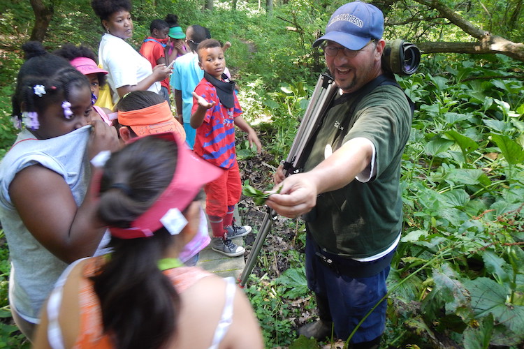 Youngsters learn about nature in the preserve in their own neighborhood.