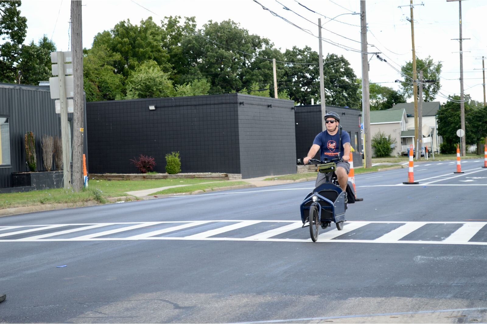 Dustin Black, traffic engineer and head of ModeShift Kalamazoo, tries out the new lanes.