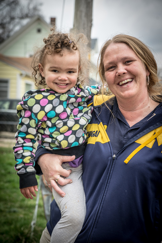 Samantha Drew holds Za’kyah.  Photo by Fran Dwight