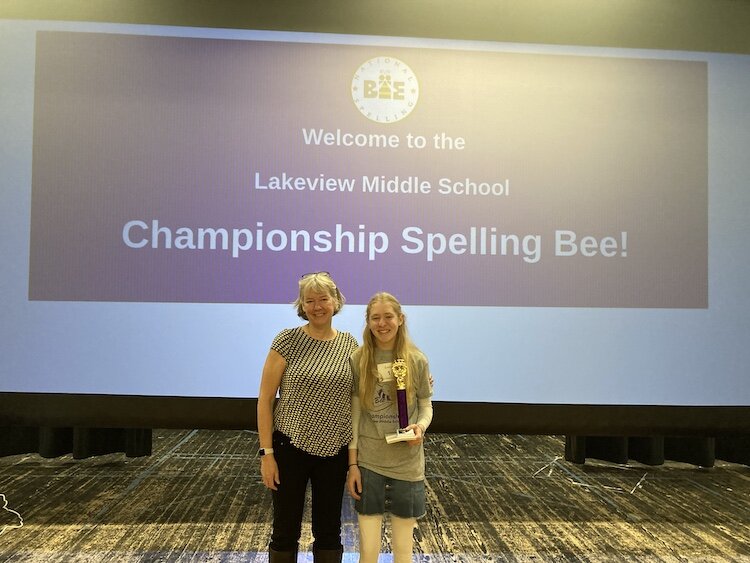 Emily Demlow, eighth grade National Spelling Bee contender, stands with her Lakeview Spelling Coach, Barb Galonsky.