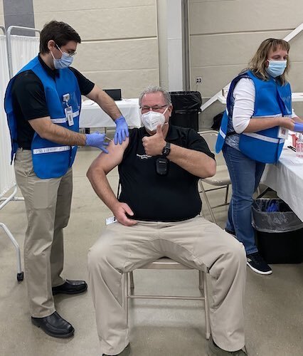 Dr. William Fales getting a vaccinaion against COVID-19.