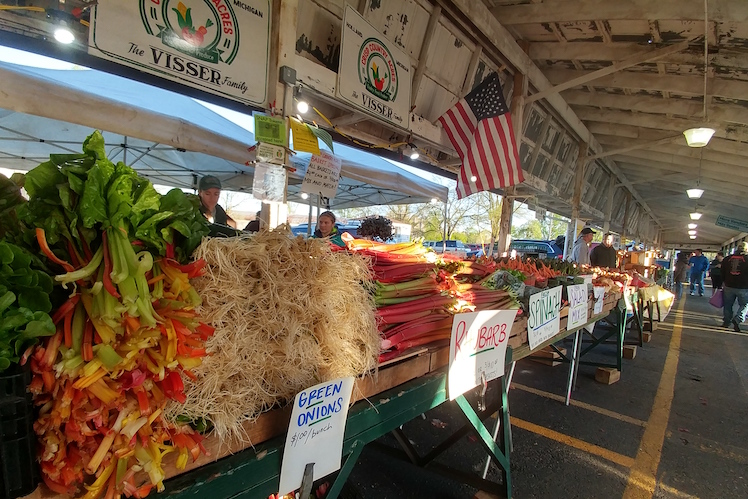 Vendors show their wares at the Farmers Market.