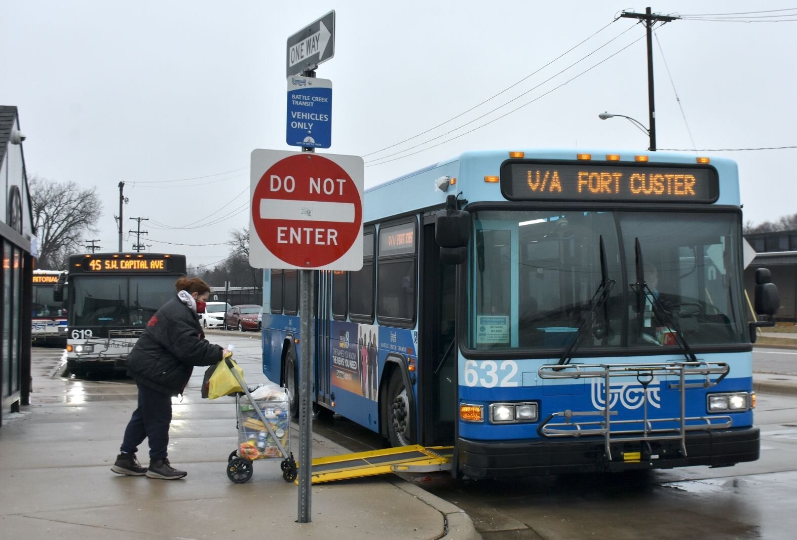 Battle Creek city buses at the downtown terminal. Bus schedules have been adjusted as bus drivers become sick with COVID.