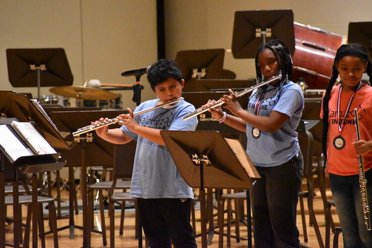 Kids in Tune students choose their instruments. 