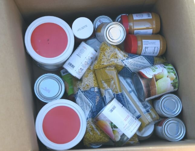 Contents of a box of food that was distributed to people outside New Level Ministries on West Van Buren Street on Saturday morning.
