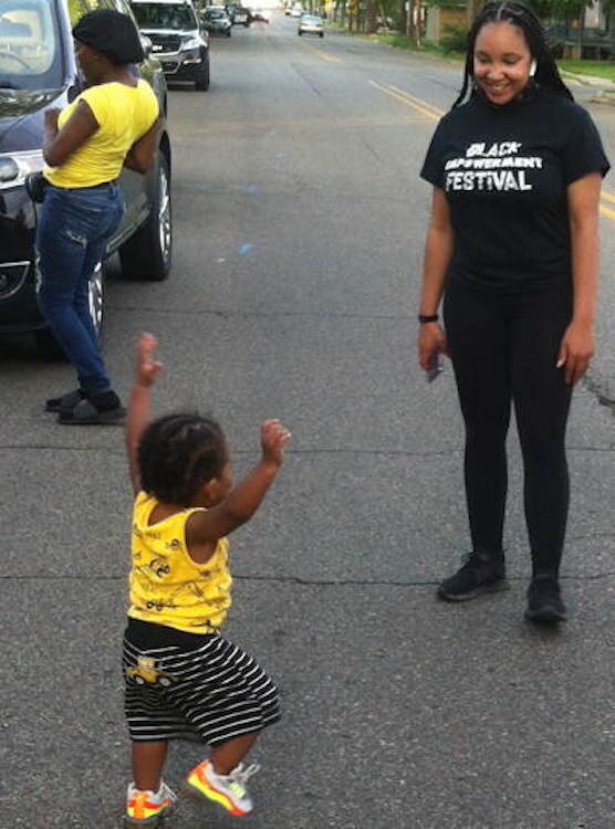 There was dancing in the street as Northside neighbors rallied behind local property owners whose houses burned recently.