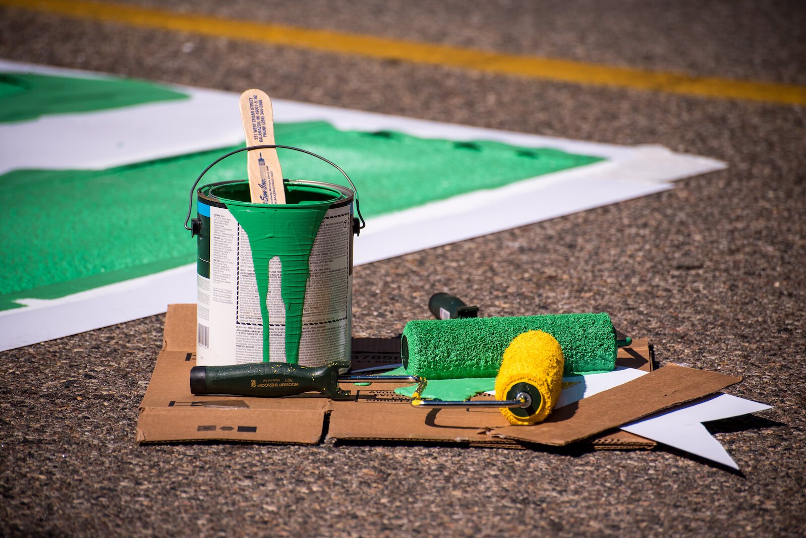 Paint used in the Black Lives Matter mural on Rose Street, between Lovell and South streets painted on Friday afternoon.