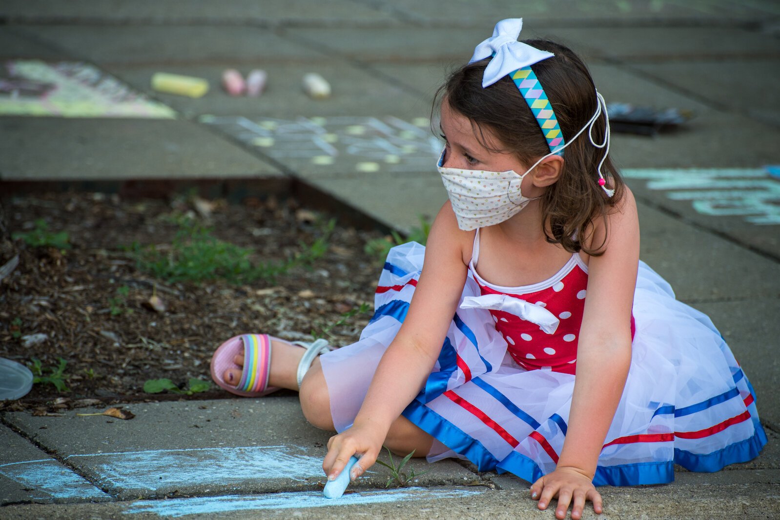 Chalk was the preferred medium for some young artists at the creation of the Black Lives Matter mural on Rose Street, between Lovell and South streets  on Friday afternoon.