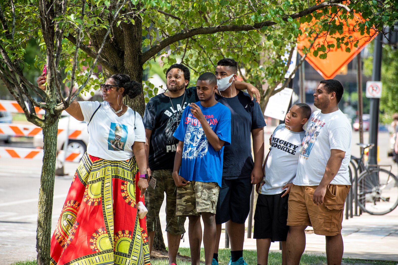 Taking in the artwork and the spirit of the day when the creation of the Black Lives Matter mural on Rose Street, between Lovell and South streets  on Friday afternoon.