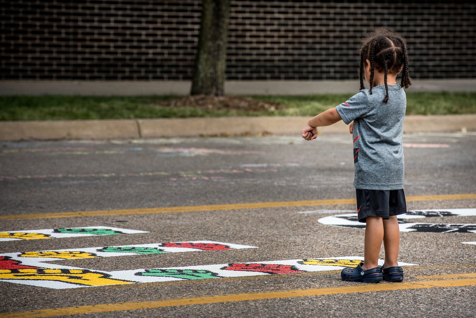 Art lovers of all ages took in the  the Black Lives Matter mural on Rose Street, between Lovell and South streets painted on Friday afternoon.