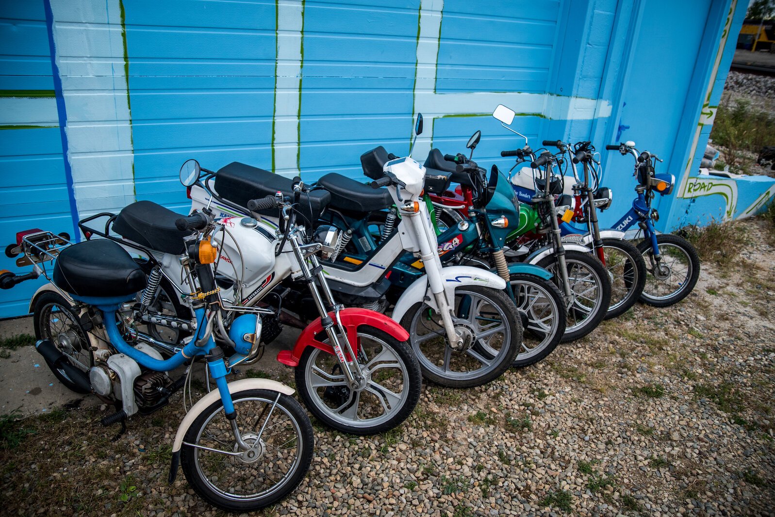 Some of the mopeds from the Quarterkick business run by Chad Burke.