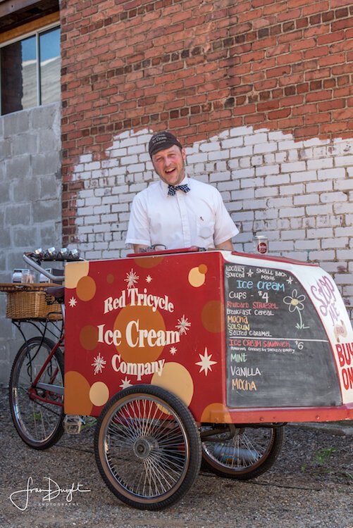 The owner of Red Tricycle Ice Cream, Ken Quayle, enjoys the old timey aspect of his bicycle ice cream business because he's "kind of a vintage guy."