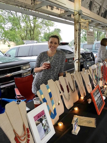 April Wagner sells Ubuntu goods at the market