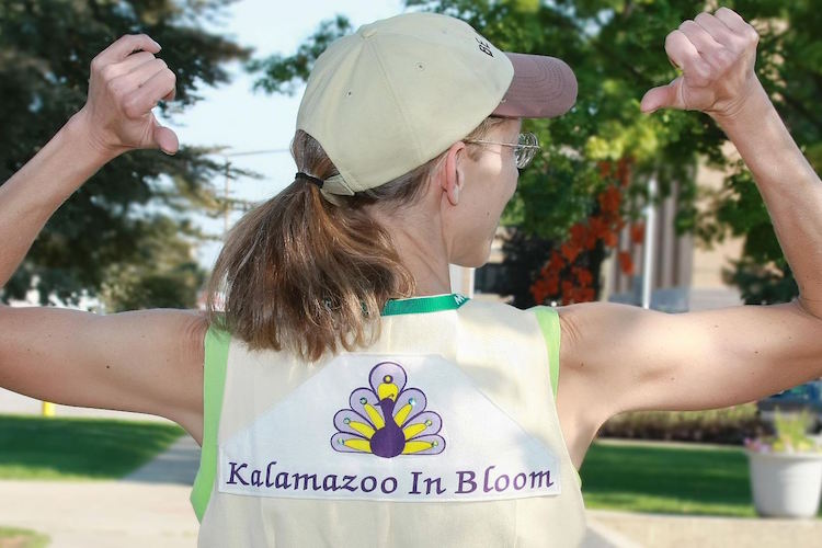 CJ Drenth, as Kalamazoo in Bloom's Garden Educator, plans, orders, and tends the flowers planted in Bronson Park each spring. 