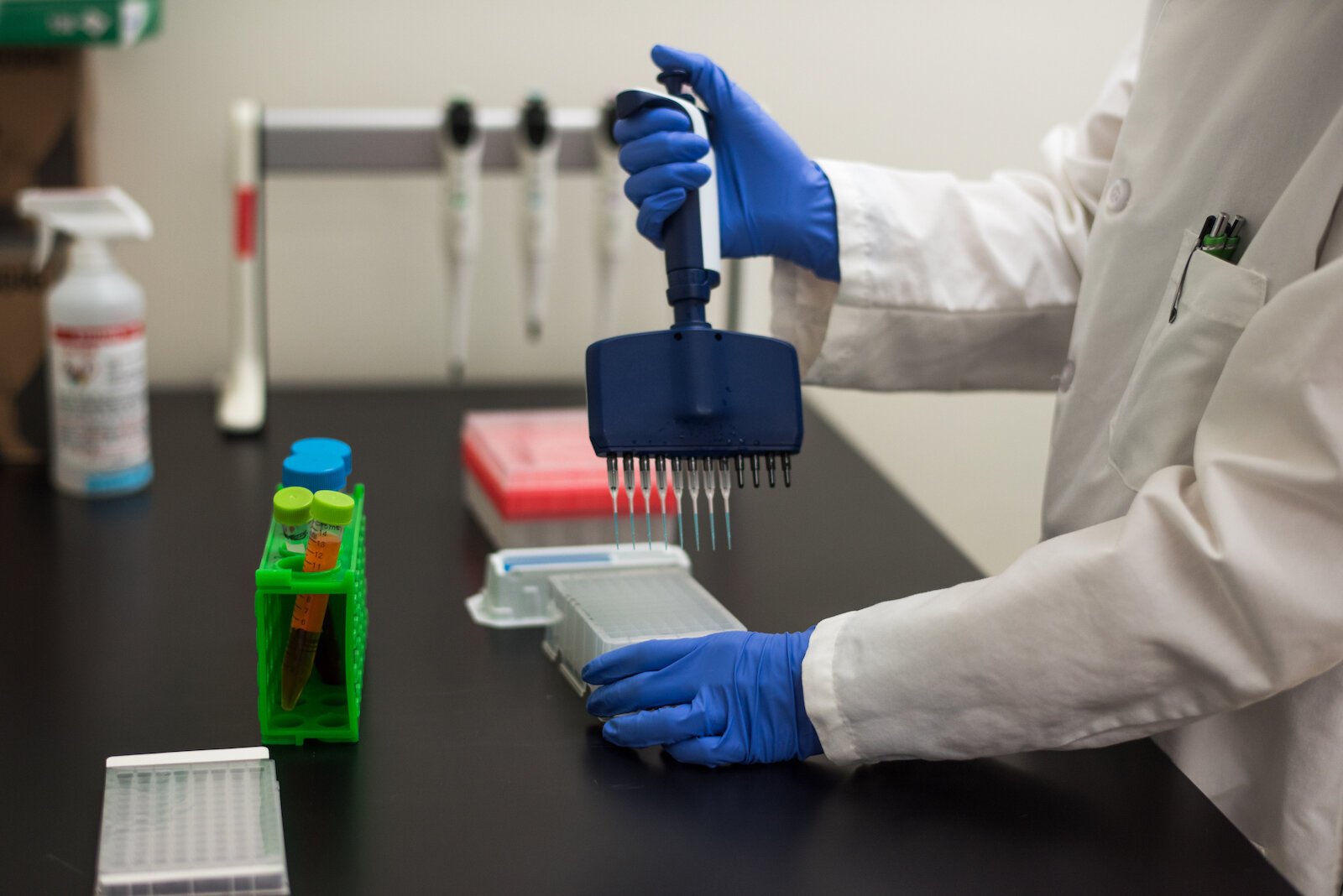 Alyson Rembowicz, senior laboratory technician at Genemarkers in Kalamazoo, demonstrates how scientists treat DNA samples with a testing agent to identify specific segments of DNA to better understand how patients will respond to specific medications