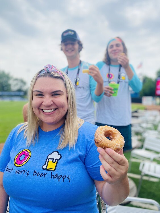 Enjoying donuts at a Donuts and Beer Festival