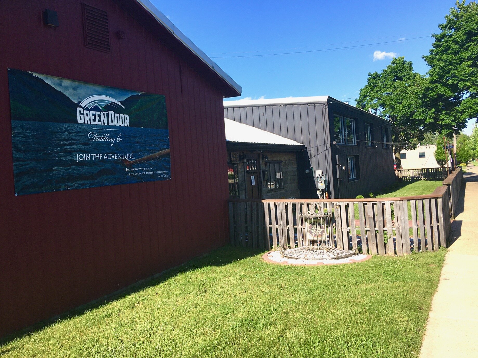 Green Door Distilling Co. is expanding the seating capacity of the greenspace just outside its 429 E. North St. location from about 25 to about 45. Tables are being placed more than six feet apart for proper social distancing.