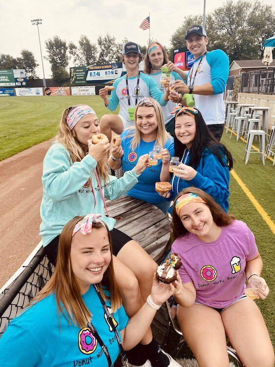 Enjoying donuts at a Donuts and Beer Festival