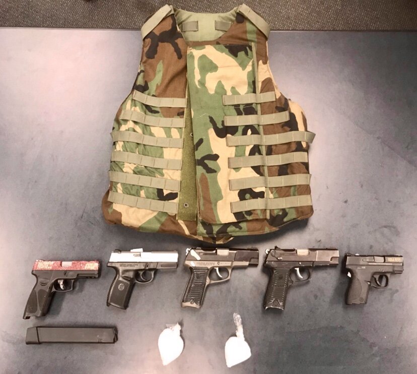 These are images of guns, drugs, a bullet-resistant vest, and cash that were confiscated over the last two months by officers with the Kalamazoo Department of Public Safety as they arrested “group involved” shooters in Kalamazoo.