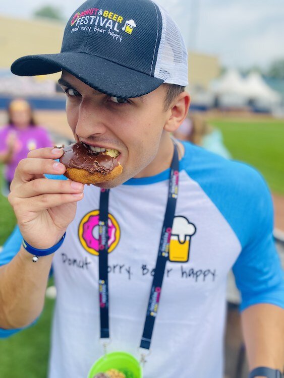 Enjoying donuts at a Donuts and Beer Festival