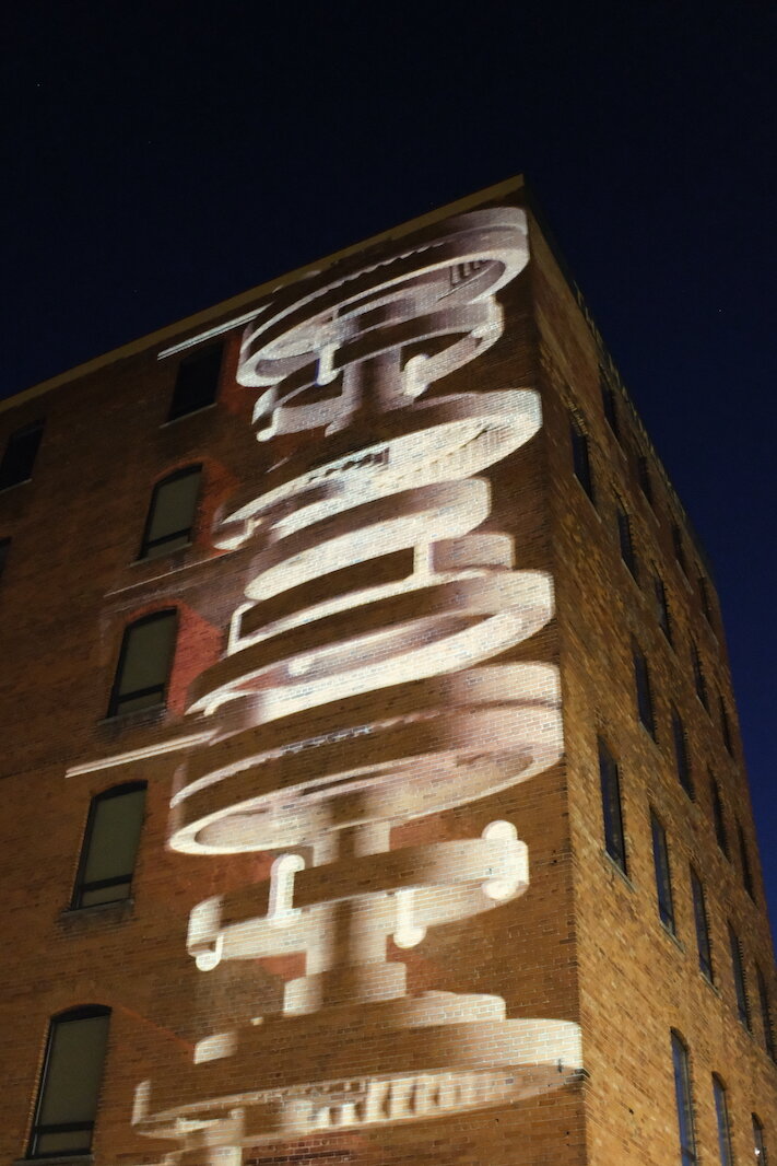 A 3D projection light show is shown in the Haymarket Plaza. 