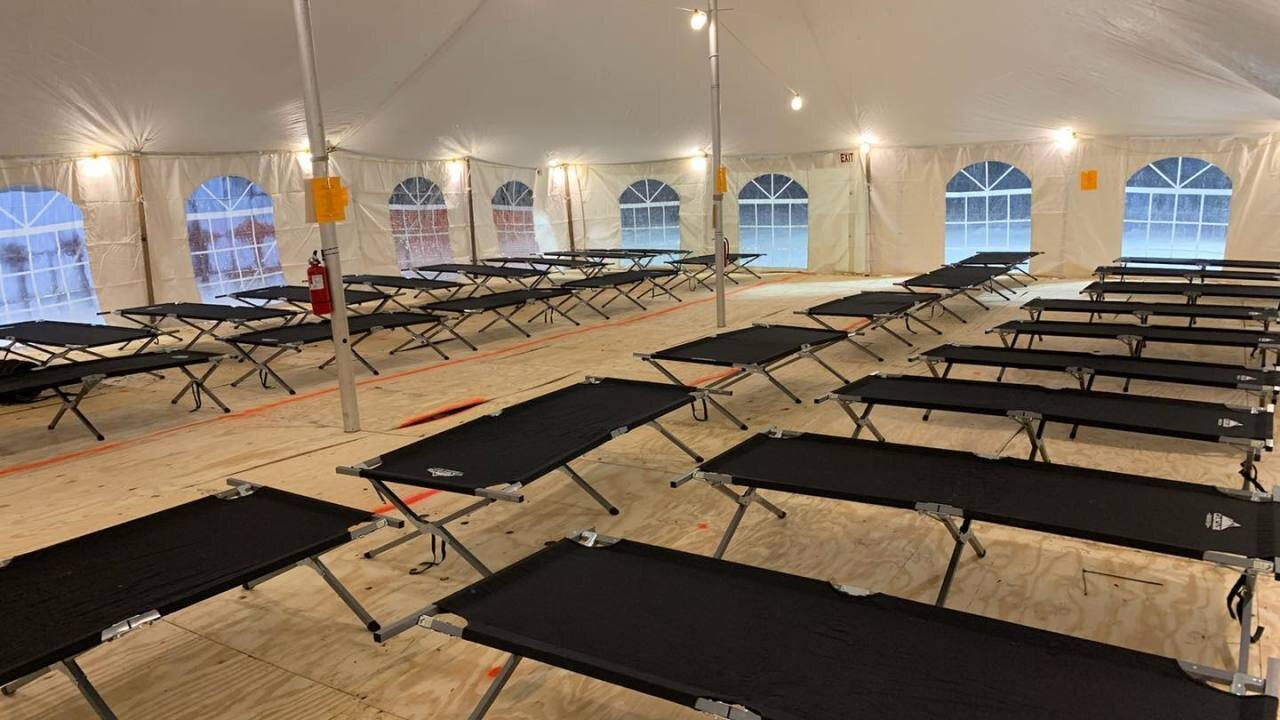 This large tent that served as a temporary warming center for the homeless adjacent to an encampment of several dozen homeless people near Mills Street, just east of downtown Kalamazoo has been removed as temperatures rise.