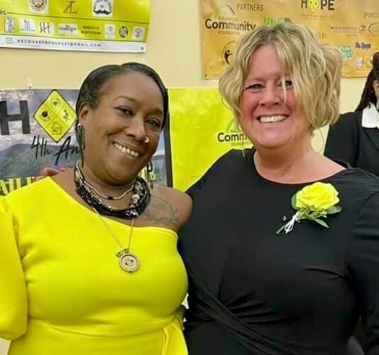 Gwendolyn Hooker, CEO of HOPE Thru Navigation, left, congratulates Judge Tiffany Ankley after winning the 2023 Judge William Schma Trailblazer of HOPE Award on Jan. 27, 2923 in Kalamazoo.