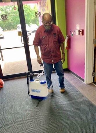 At New Genesis, classrooms are cleaned three times a day with the third time done by maintenance staff. The learning program has hired more maintenance help, purchased more cleaning machines and installed new flooring to make it easier to sanitize du