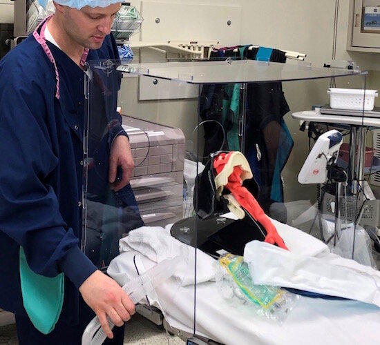 Kalamazoo nurse anesthetist Brady Beauchamp shows the Aero-Guard intubation box.