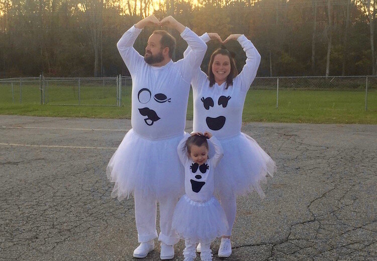 Jeremy and his wife, Erin, with their daughter. 