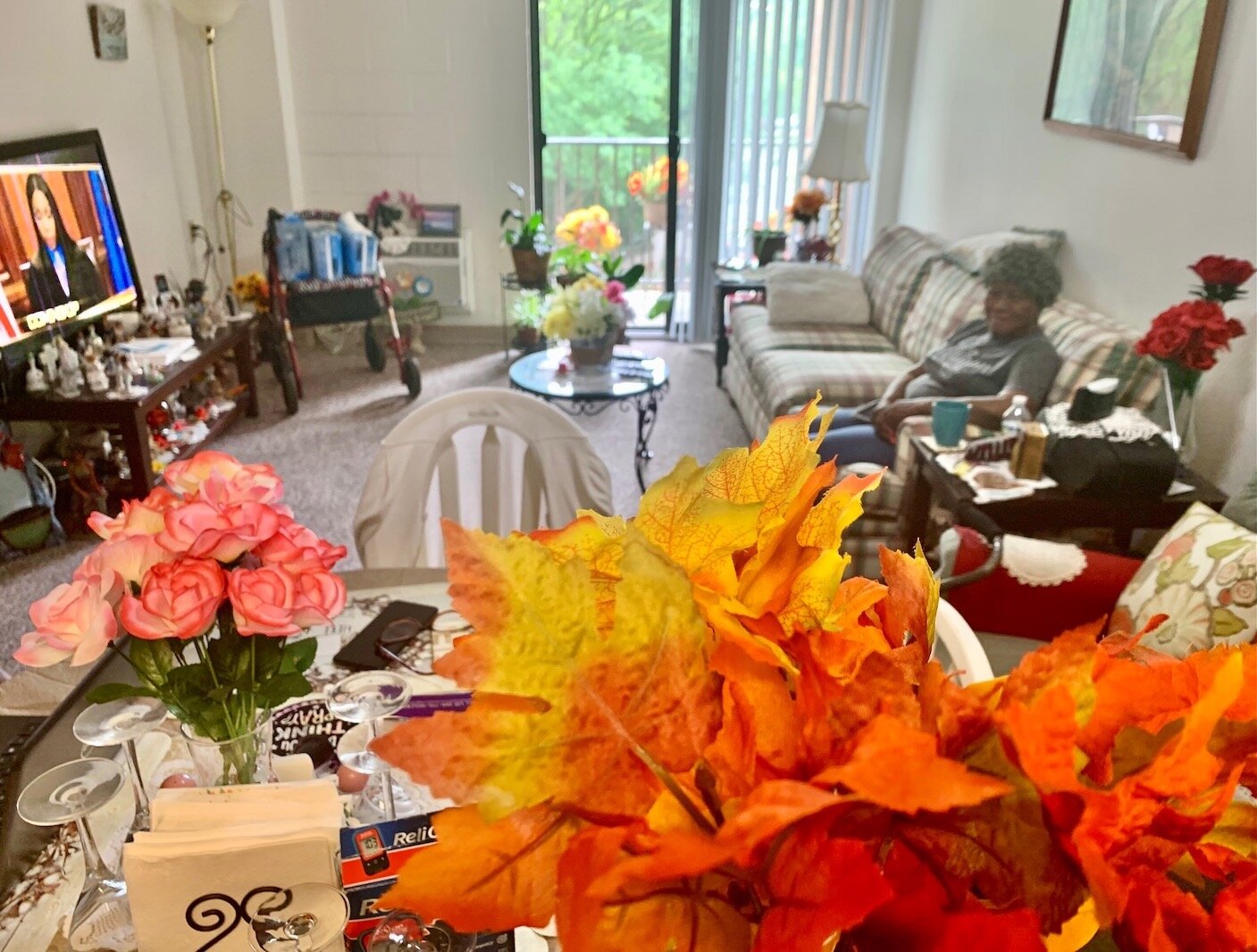 Katherine White relaxes on a recent afternoon in her Kalamazoo apartment.