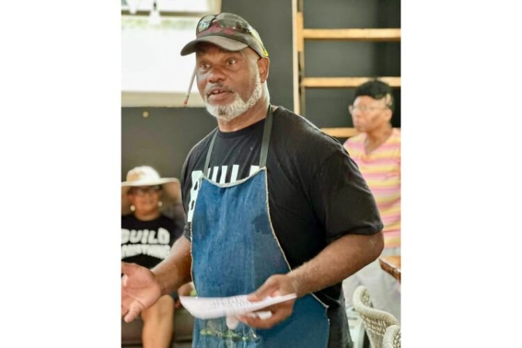 Educator and tiny house builder Raymond Gant introduced members of Girls Build Kalamazoo to sanders, impact drivers, tape measures, jigsaws, circular saws, routers, and other tools as he helped them create beautiful benches.