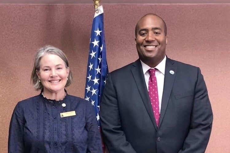 Michigan Sen. Sue Shink (D-Northfield) stands in April of 2024 with Arturo Puckerin, then executive director of the Jackson Housing Commission.