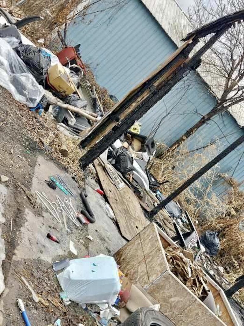 Lanae Newton says the yard of the condemned Stockbridge Avenue house next door to her has become an illegal dumping area for unscrupulous people in the area.