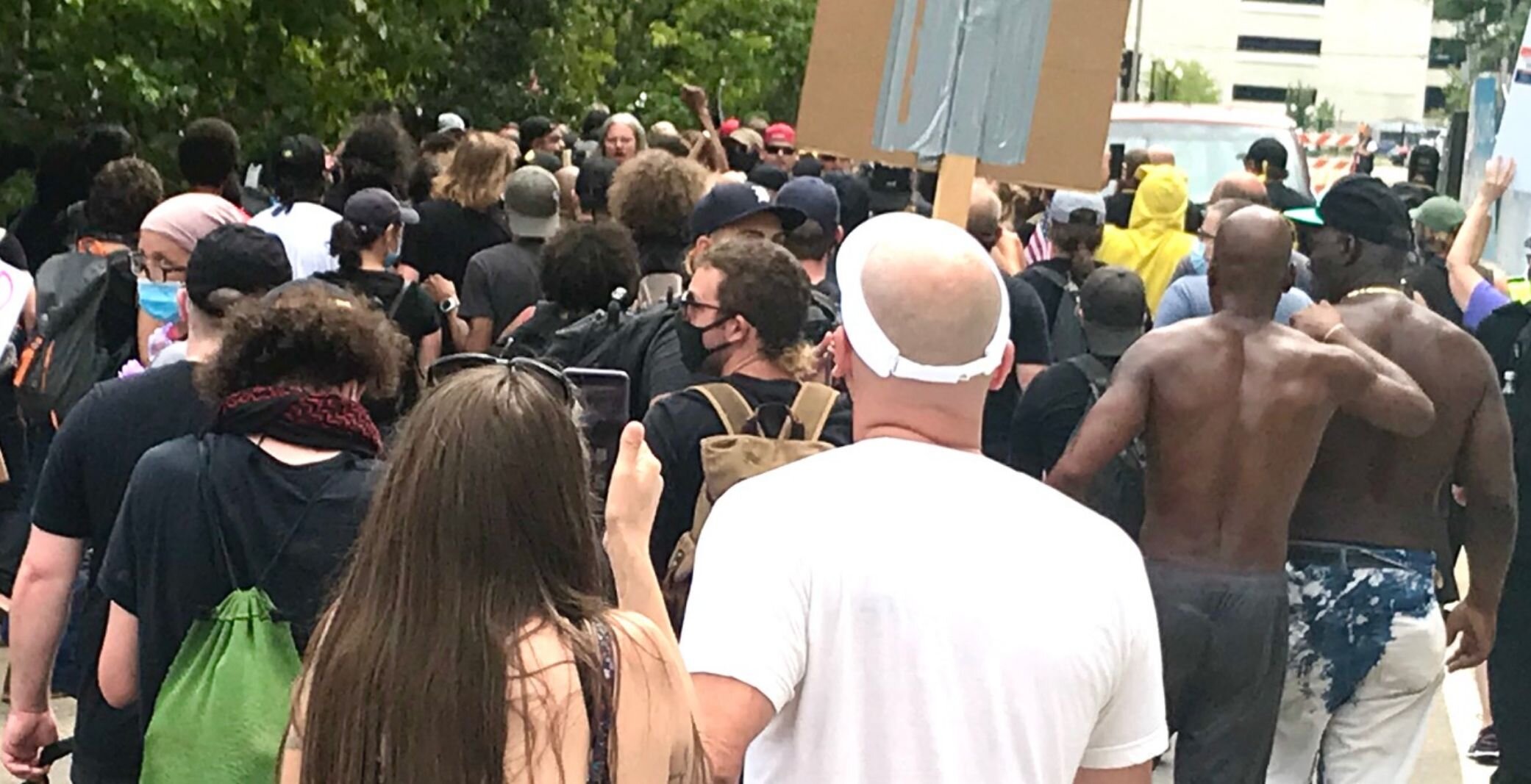 Counter-protesters, foreground, begin to clash with members of the Proud Boys, background, at the intersection of water Street and Edwards Street.