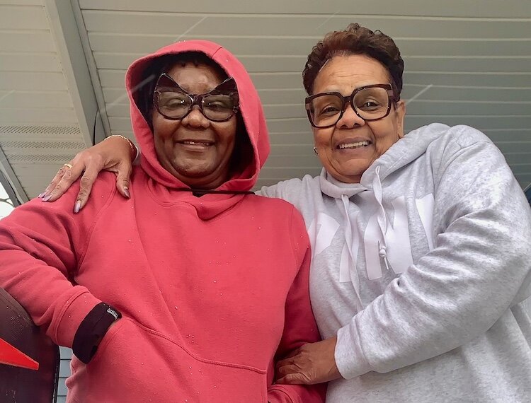 Gwen Lanier and Delores Johnson stand on the porch of the 603 Ada St. house that serves as the headquarters for Mothers of Hope.