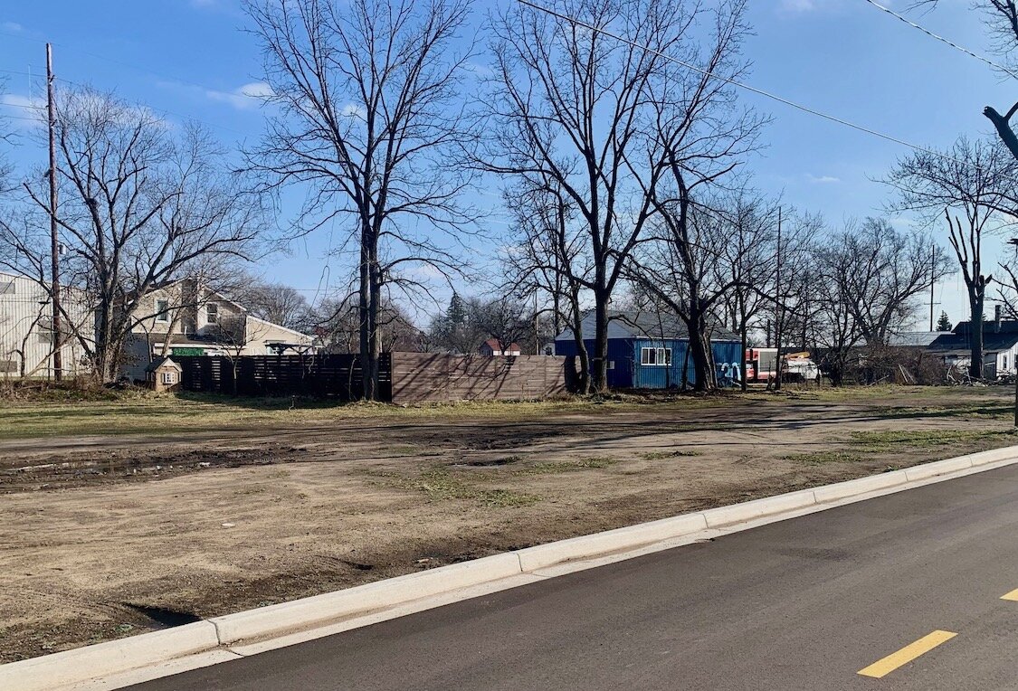 Vacant city-owned property on the east side of Pitcher Street (across from the recently-built apartments) is the intended site for Phase 2 of Zone 32.