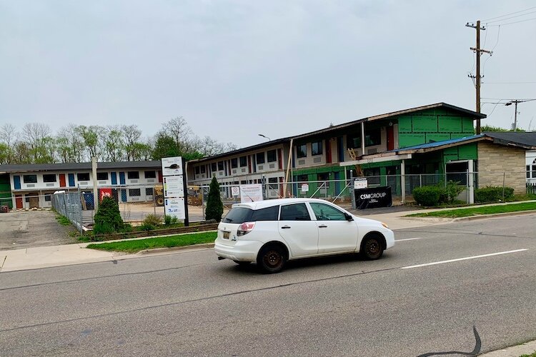 A car whizzes past 1211 S. Westnedge Ave., a former motel that is being converted into studio apartments for people with very limited means.