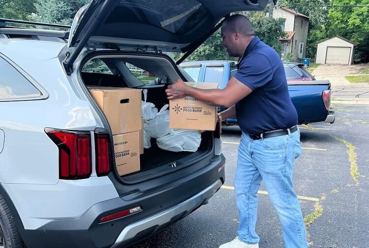 Executive Director Aruro Puckerin says the Kalamazoo Eastside Neighborhood Association's food distribution program is one of several programs that help financially struggling area residents.