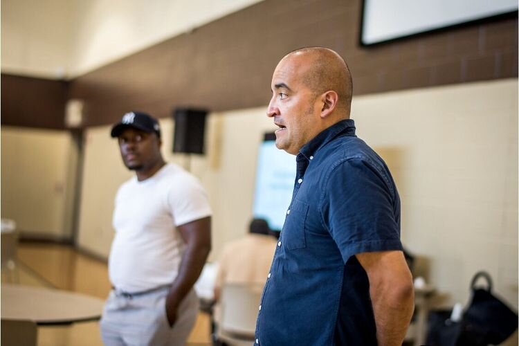 As an associate developer for Hollander Development Corp., Jamauri Bogan, left, joins Jason Muniz, company Vice President, answering questions during a July 21, 2022 community meeting on plans for a the new Legacy Senior Housing project.