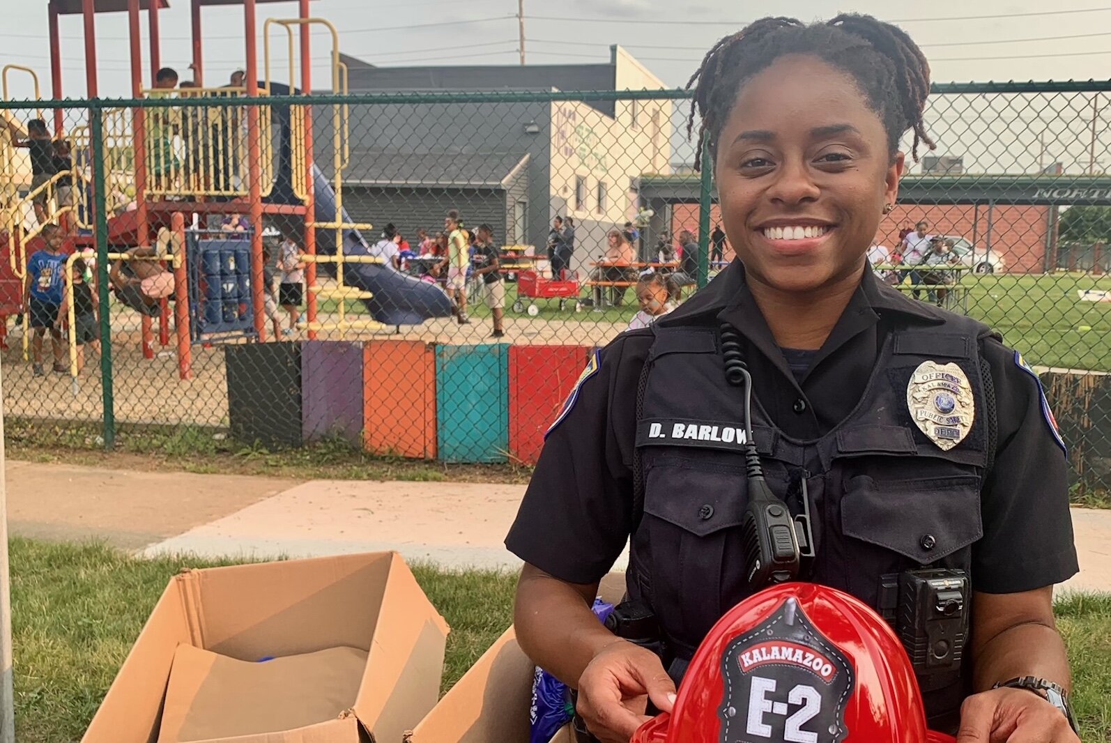Community Service Officer Dajanick Barlow was among Kalamazoo Public Safety officers talkin with families on Tuesday afternoon during National Night Out in the Northside Neighborhood.