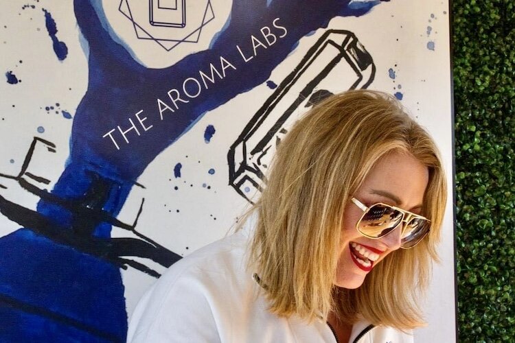 Founder Tanya Thompson works inside Big Blue, The Aroma Labs’ mobile scent-making experience.
