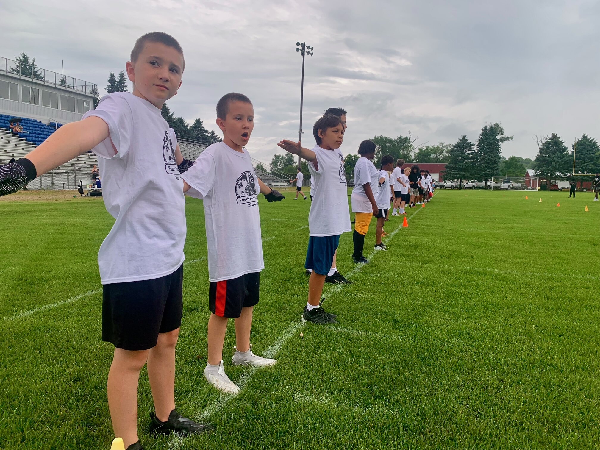Youngsters from ages 6 to 14 lined up Saturday, Aug. 26, 2025 at Mayor’s Riverfront Park for the first annual Kalamazoo Youth Football Camp. 